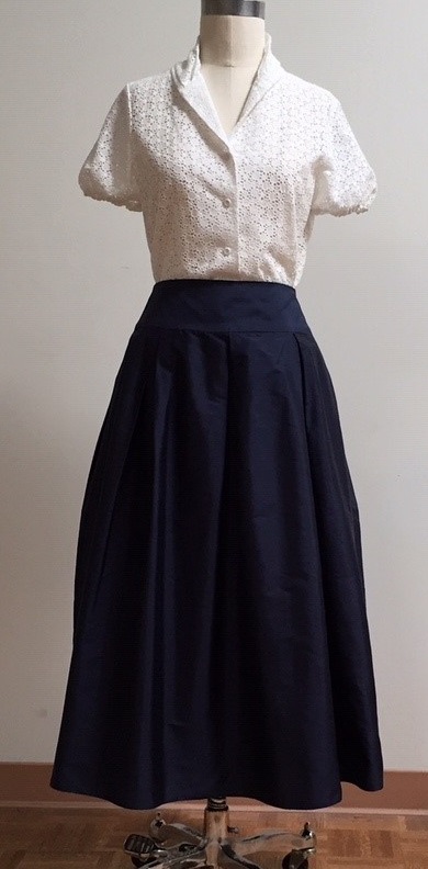 Navy tea length skirt and white blouse