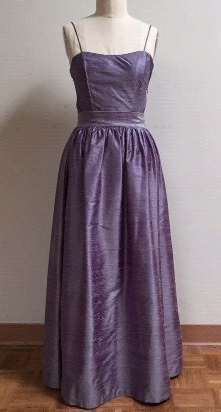 purple camisole and long purple skirt