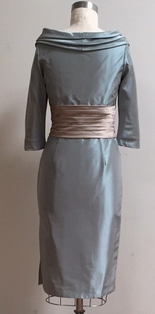 Blue dress with high back and sleeves