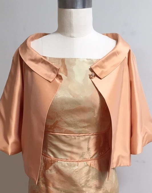 Apricot jacket and dress for special occasion