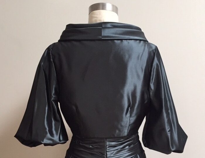 Short dark blue evening jacket