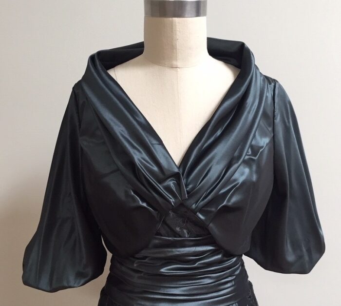 Short dark blue evening jacket
